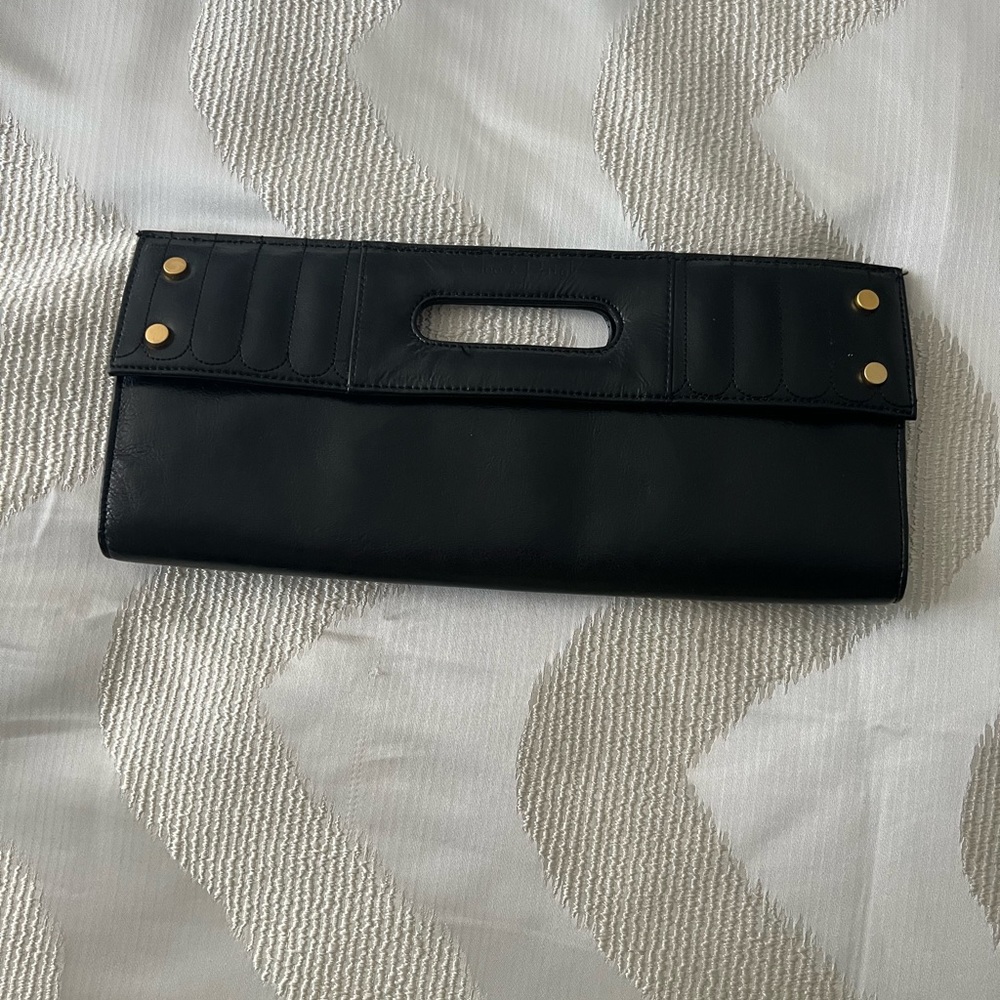 Cleo & Patek leather clutch